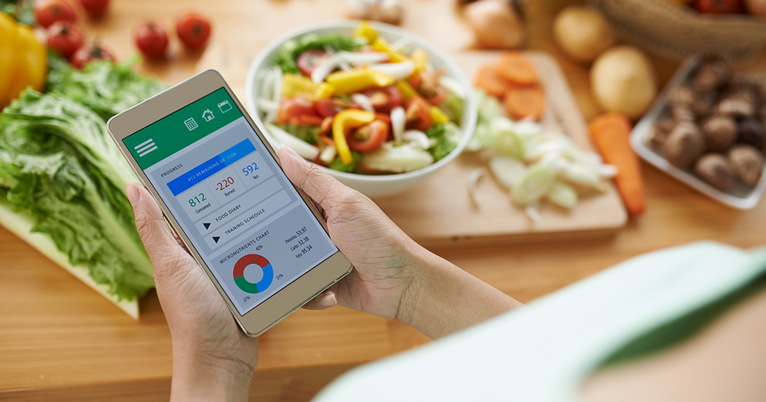 person looking at nutrition tracker