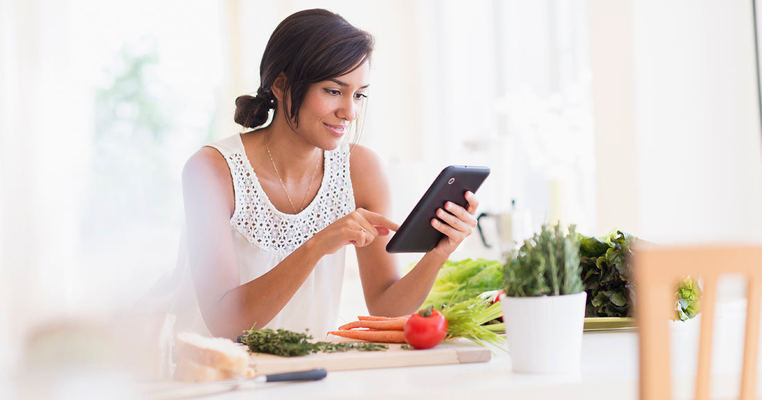 woman looking at ipad
