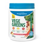 A container of Progressive VegeGreens powder with images of various green vegetables and fruits on the label, indicating a natural and healthy product.